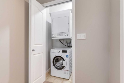 1014-1111 6 Avenue Sw, Calgary, AB - Indoor Photo Showing Laundry Room