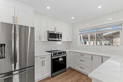304 Huntbourne Hill Ne, Calgary, AB - Indoor Photo Showing Kitchen With Stainless Steel Kitchen With Upgraded Kitchen