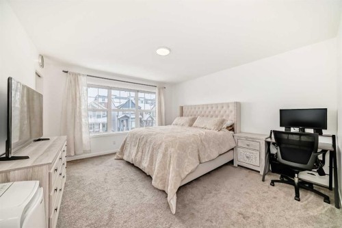 355 Masters Row Se, Calgary, AB - Indoor Photo Showing Bedroom