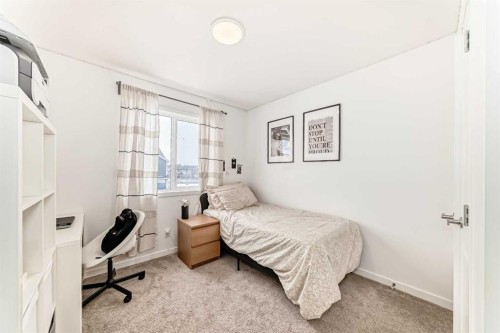 355 Masters Row Se, Calgary, AB - Indoor Photo Showing Bedroom