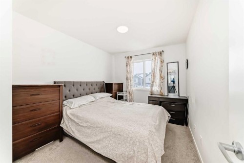 355 Masters Row Se, Calgary, AB - Indoor Photo Showing Bedroom