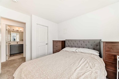 355 Masters Row Se, Calgary, AB - Indoor Photo Showing Bedroom