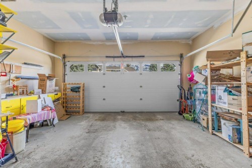 35-216 Three Sisters Drive, Canmore, AB - Indoor Photo Showing Garage