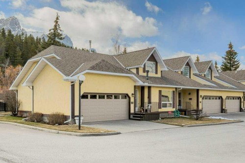 35-216 Three Sisters Drive, Canmore, AB - Outdoor With Facade