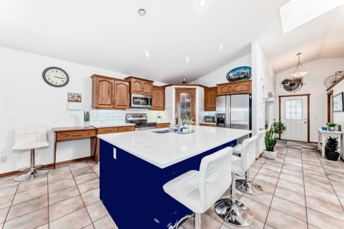 112 West Creek Glen, Chestermere, AB - Indoor Photo Showing Kitchen With Double Sink