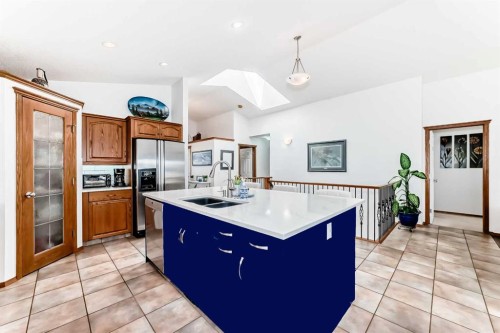 112 West Creek Glen, Chestermere, AB - Indoor Photo Showing Kitchen With Double Sink