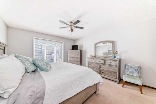 112 West Creek Glen, Chestermere, AB - Indoor Photo Showing Bedroom