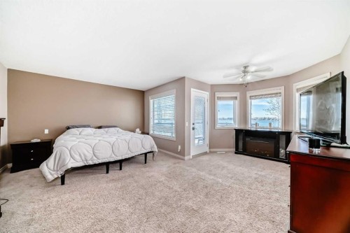 291 East Chestermere Drive, Chestermere, AB - Indoor Photo Showing Bedroom