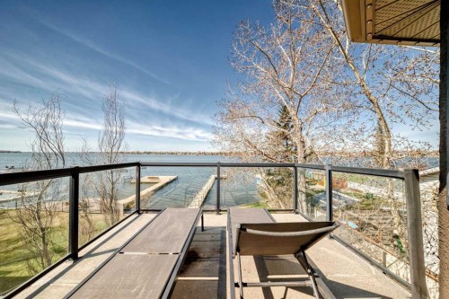 291 East Chestermere Drive, Chestermere, AB - Outdoor With Body Of Water With Balcony With View