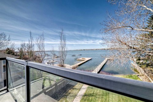 291 East Chestermere Drive, Chestermere, AB - Outdoor With Body Of Water With Balcony With View
