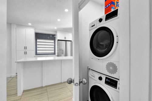 611 Penbrooke Road Se, Calgary, AB - Indoor Photo Showing Laundry Room