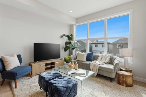 21 Wild Rose Way Se, Calgary, AB - Indoor Photo Showing Living Room