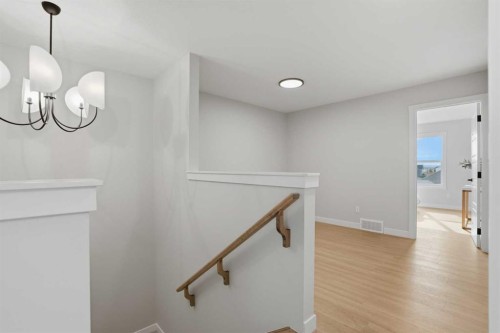21 Wild Rose Way Se, Calgary, AB - Indoor Photo Showing Other Room