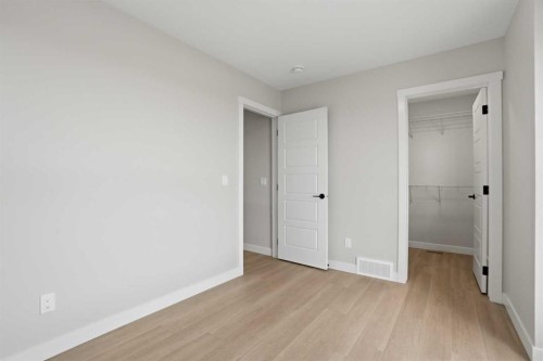 21 Wild Rose Way Se, Calgary, AB - Indoor Photo Showing Other Room