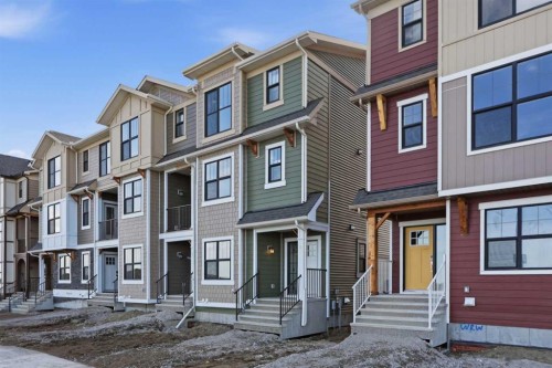 21 Wild Rose Way Se, Calgary, AB - Outdoor With Facade