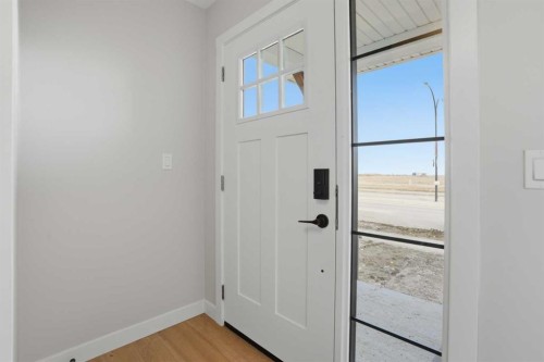 21 Wild Rose Way Se, Calgary, AB - Indoor Photo Showing Other Room