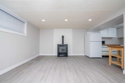 6036 4 Street Ne, Calgary, AB - Indoor With Fireplace