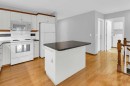 4-604 Griffin Road West, Cochrane, AB  - Indoor Photo Showing Kitchen 