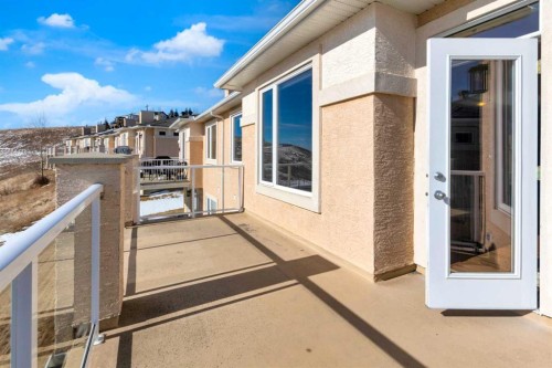 106-1000 Glenhaven Way, Cochrane, AB - Outdoor With Exterior