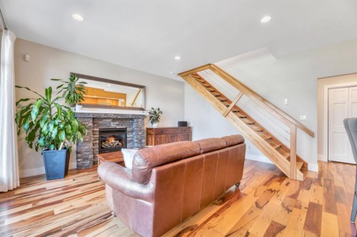 31 Ranch Road, Okotoks, AB - Indoor Photo Showing Other Room With Fireplace