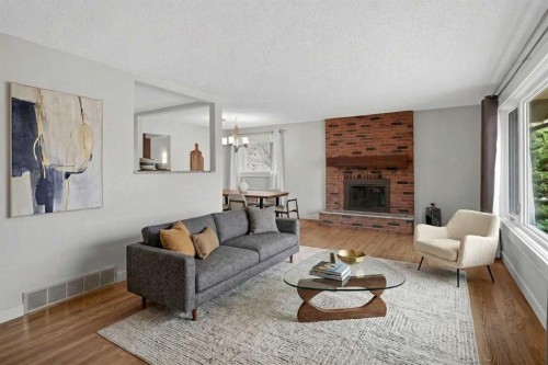 14543 Parkside Drive Se, Calgary, AB - Indoor Photo Showing Living Room With Fireplace