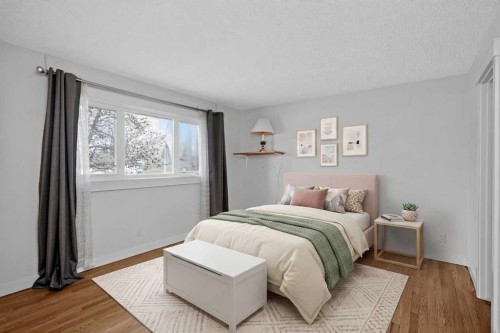 14543 Parkside Drive Se, Calgary, AB - Indoor Photo Showing Bedroom