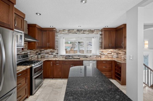 14543 Parkside Drive Se, Calgary, AB - Indoor Photo Showing Kitchen With Upgraded Kitchen