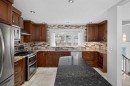 14543 Parkside Drive Se, Calgary, AB  - Indoor Photo Showing Kitchen With Upgraded Kitchen 