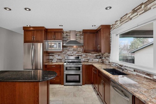 14543 Parkside Drive Se, Calgary, AB - Indoor Photo Showing Kitchen With Upgraded Kitchen