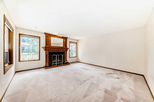 164 Cove Road, Chestermere, AB - Indoor With Fireplace