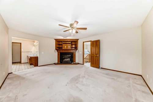 164 Cove Road, Chestermere, AB - Indoor With Fireplace
