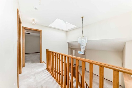 164 Cove Road, Chestermere, AB - Indoor Photo Showing Other Room