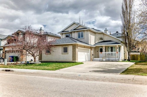 164 Cove Road, Chestermere, AB - Outdoor With Deck Patio Veranda With Facade