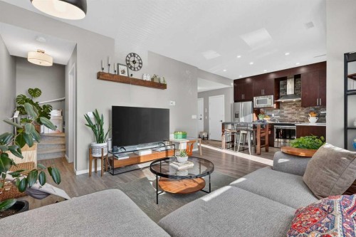 203-445 Redstone Ne, Calgary, AB - Indoor Photo Showing Living Room