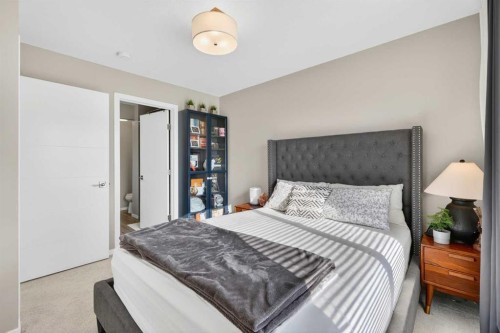 203-445 Redstone Ne, Calgary, AB - Indoor Photo Showing Bedroom