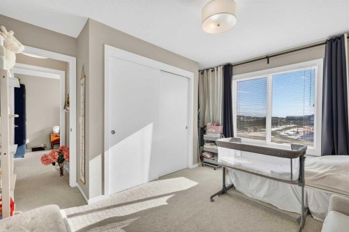 203-445 Redstone Ne, Calgary, AB - Indoor Photo Showing Bedroom