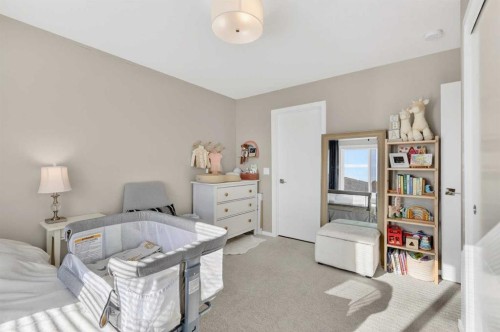 203-445 Redstone Ne, Calgary, AB - Indoor Photo Showing Bedroom