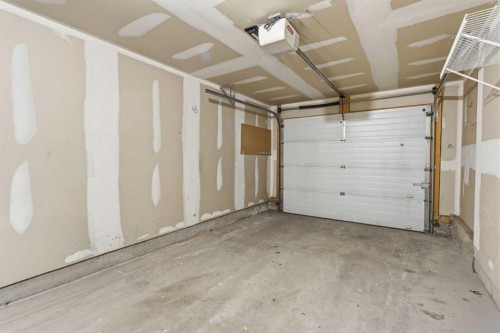 166 Everhollow Heights Sw, Calgary, AB - Indoor Photo Showing Garage