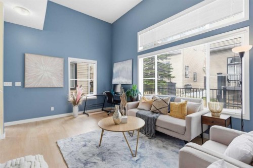 166 Everhollow Heights Sw, Calgary, AB - Indoor Photo Showing Living Room