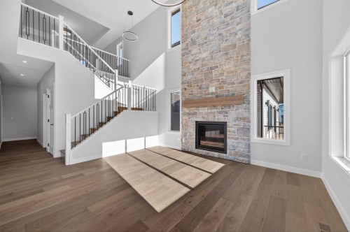 709 Dawson Common, Chestermere, AB - Indoor With Fireplace