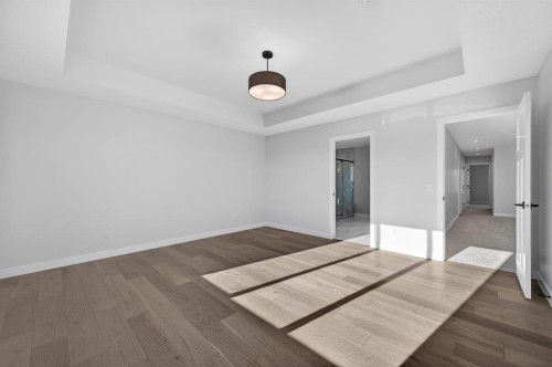 709 Dawson Common, Chestermere, AB - Indoor Photo Showing Other Room