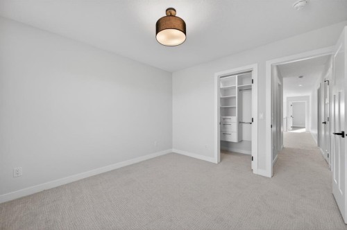 709 Dawson Common, Chestermere, AB - Indoor Photo Showing Other Room