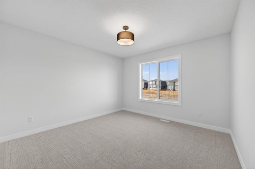 709 Dawson Common, Chestermere, AB - Indoor Photo Showing Other Room