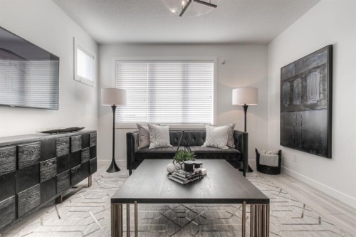 34 Bridgeport Circle, Chestermere, AB - Indoor Photo Showing Living Room