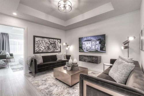 34 Bridgeport Circle, Chestermere, AB - Indoor Photo Showing Living Room