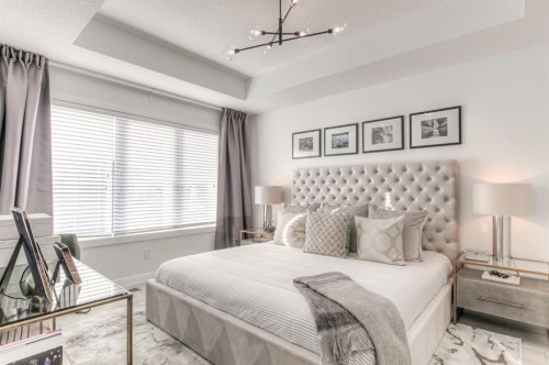 34 Bridgeport Circle, Chestermere, AB - Indoor Photo Showing Bedroom