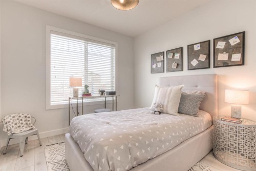 34 Bridgeport Circle, Chestermere, AB - Indoor Photo Showing Bedroom