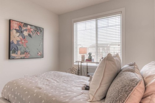 34 Bridgeport Circle, Chestermere, AB - Indoor Photo Showing Bedroom