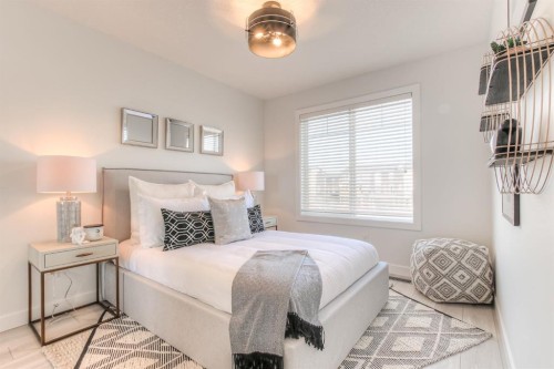 34 Bridgeport Circle, Chestermere, AB - Indoor Photo Showing Bedroom