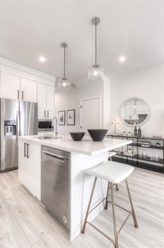 34 Bridgeport Circle, Chestermere, AB - Indoor Photo Showing Kitchen With Stainless Steel Kitchen